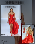 Shop Sherri Hill 58481, a sparkling strapless hot fix cocktail dress featuring a dramatic side cape for a standout special occasion look at Joyce’sTPR.