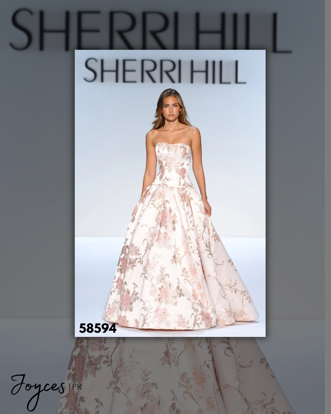 Shop Sherri Hill 58594, a strapless drop-waist brocade ballgown in romantic Blush Print with a dramatic full skirt at Joyce’sTPR.