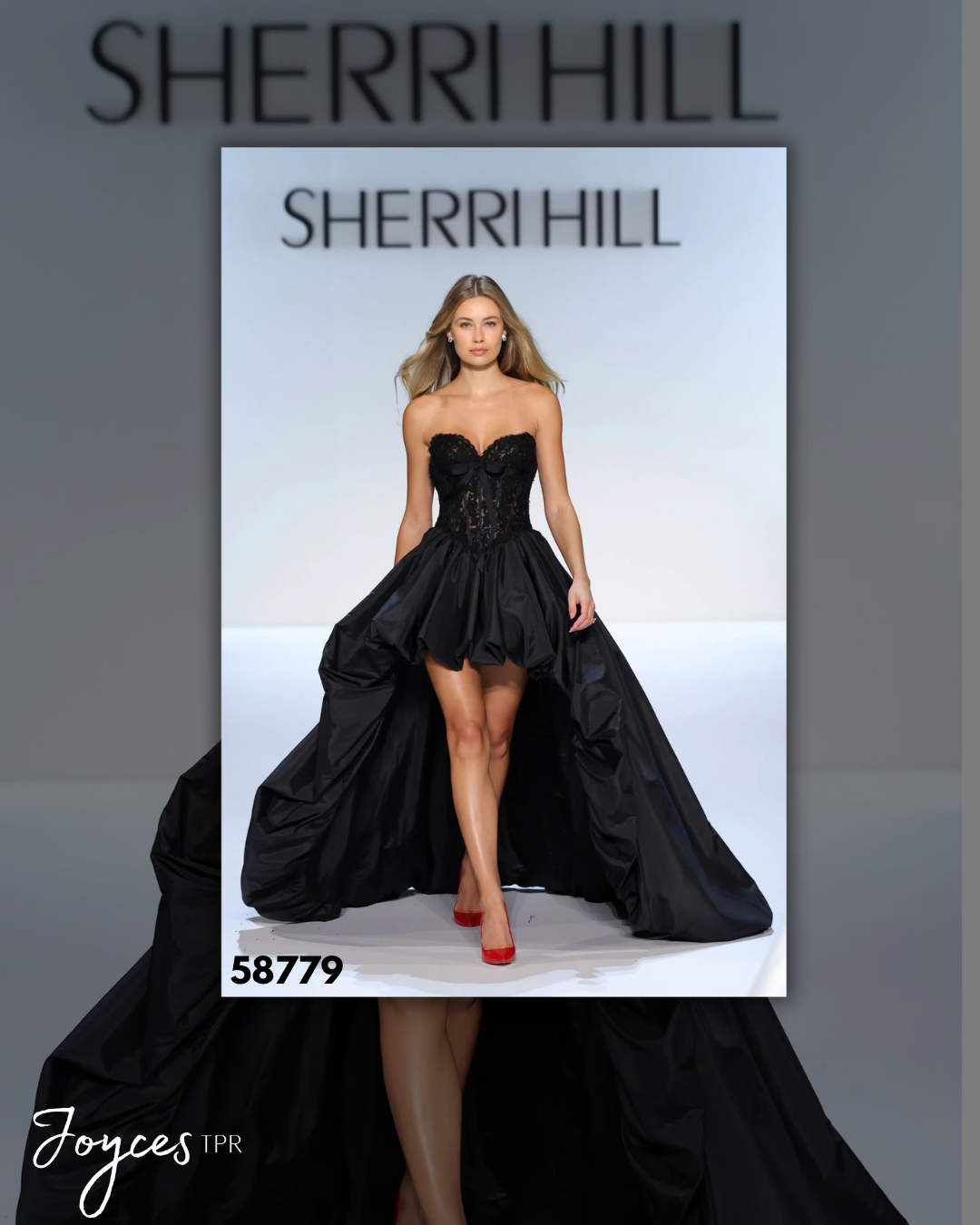 Shop Sherri Hill 58779, a strapless high-low gown featuring a lace corset bodice and dramatic statement skirt at Joyce’sTPR.